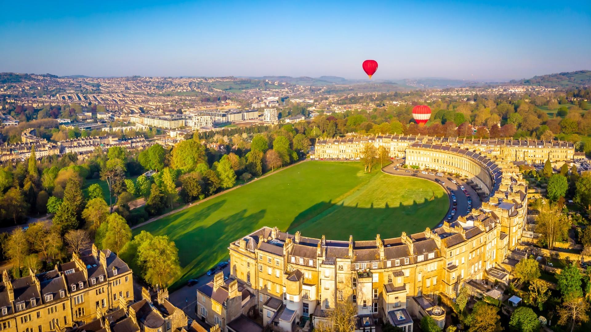 The Roman Baths with steaming thermal waters and Georgian architecture, Bath, England